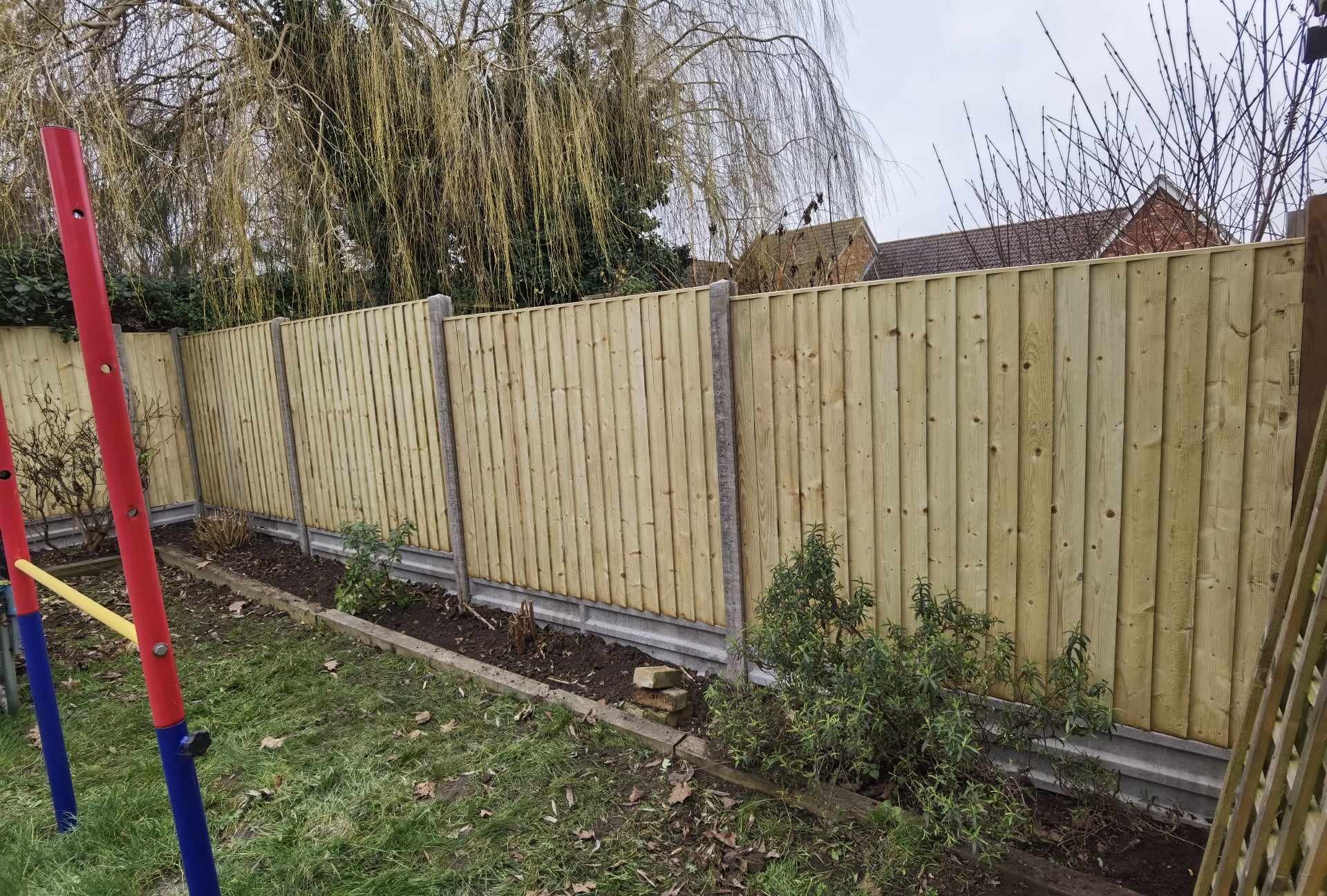 Fencing & gates Suffolk — Newly installed wooden fence panels with concrete posts and base
